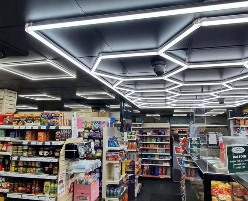 Hexagon lighting in a supermarket highlighting SGF Electrical Contractors' commercial and industrial electrical services, Kennoway commercial electrician, Leven industrial electrical installations, Fife lighting solutions for businesses