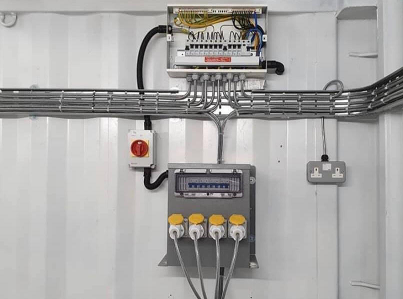 Electrical box with wires illustrating SGF Electrical Contractors' testing and rewiring services, electrical safety inspections in Kennoway, rewiring services in Leven, Fife electrical fault diagnostics